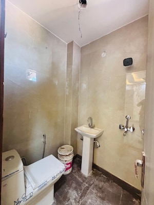 Bathroom in 3 BHK Builder Floor at Dwarka Mor – for Rent