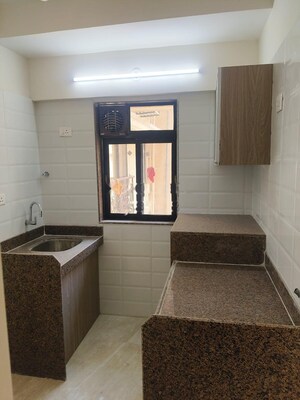 Kitchen in 1.5 BHK Apartment at Chandiwala Pearl Heaven, Andheri East – for Rent