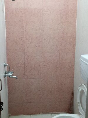 Bathroom in 4 BHK Builder Floor at Dhakoli – for Sale