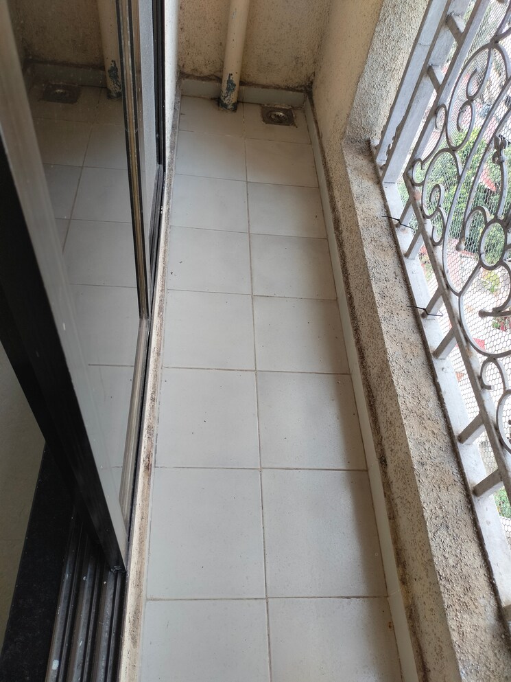 Balcony, cosmos-jewels 2 Bedroom 700 Sq.Ft. Apartment In Ghodbunder Road Thane 9363506