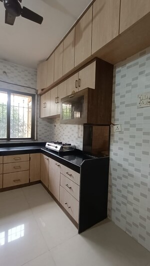 Kitchen in 1 BHK Apartment at Krishna Greenland Park Vastu Federation, Ghodbunder Road – for Sale