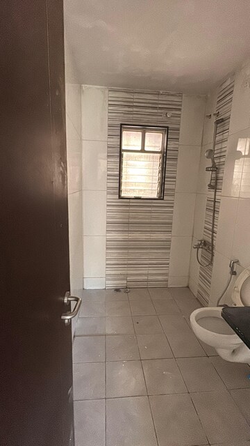 Bathroom in 2 BHK Apartment at Paranjape Forest Trails The Highlands, Bhugaon – for Rent