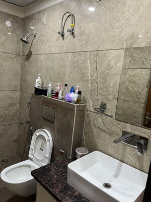 Bathroom in 3 BHK Apartment at NK Sharma Savitry Greens 2, Ghazipur – for Rent