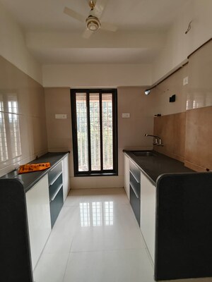 Kitchen in 2 BHK Apartment at Puraniks One Hometown, Ghodbunder Road – for Sale