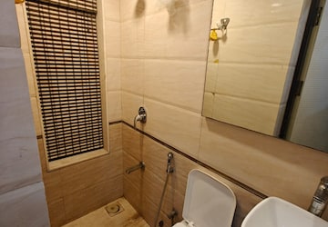 Bathroom in 4 BHK Apartment at DLH Sorrento, Veera Desai Road – for Rent