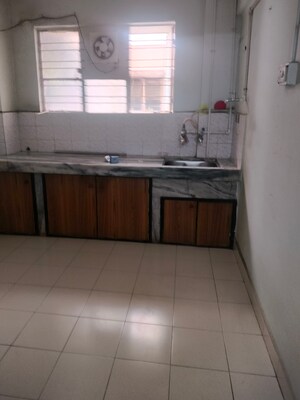 Kitchen in 1 BHK Apartment at Amba Nagari, Dhanori – for Rent