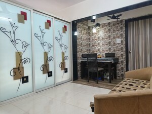 Living Room in 2 BHK Apartment at Rajkumar Corner CHS, Andheri West – for Rent