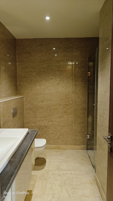 Bathroom in 4 BHK Apartment at Ambience Tiverton, Sector 50 – for Rent