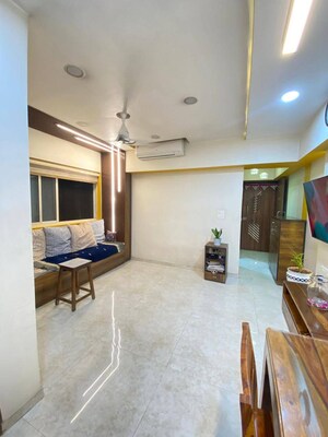 Living Room in 2 BHK Apartment at Lodha Amara, Kolshet Road – for Rent
