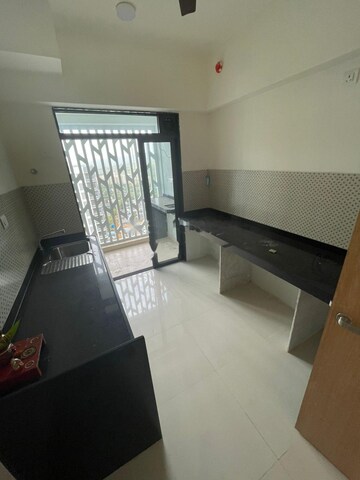 Team Area in 2 BHK Apartment at Lodha Woods, Kandivali East – for Rent