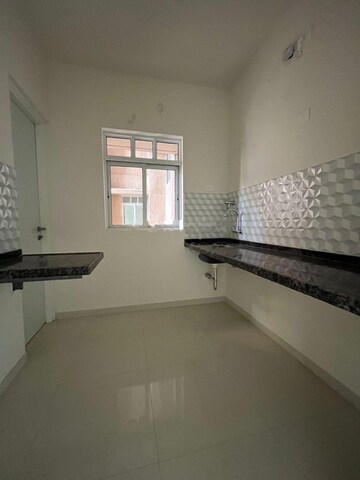 Kitchen in 1 BHK Apartment at Godrej Green Cove, Mahalunge – for Rent