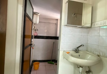 Bathroom in 1 BHK Apartment at Puraniks Kanchanpushp Complex, Kavesar – for Rent