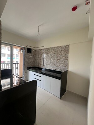Kitchen in 2 BHK Apartment at Raunak Residency Thane, Pokhran Road No One – for Sale