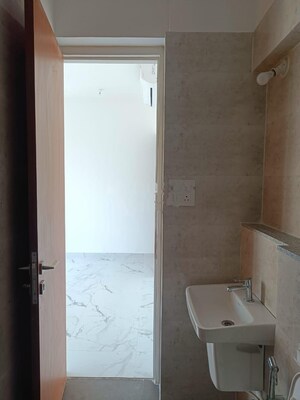 Bathroom in 2 BHK Apartment at Dynamix Avanya, Dahisar East – for Rent