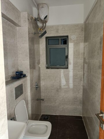 Bathroom in 2 BHK Apartment at Dynamix Avanya, Dahisar East – for Rent