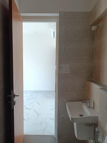 Bathroom in 2 BHK Apartment at Dynamix Avanya, Dahisar East – for Rent