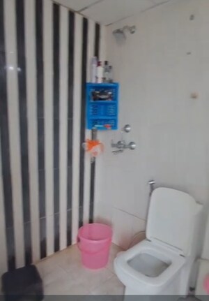 Bathroom in 2 BHK Apartment at Nilaya Greens, Raj Nagar Extension – for Sale