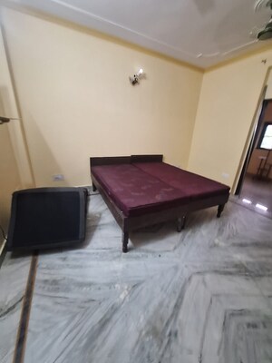 Bedroom in 1.5 BHK Builder Floor at Ansal Plaza Sector-23, Sector 23 – for Rent