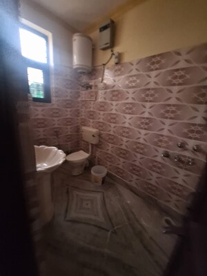 Bathroom in 1.5 BHK Builder Floor at Ansal Plaza Sector-23, Sector 23 – for Rent