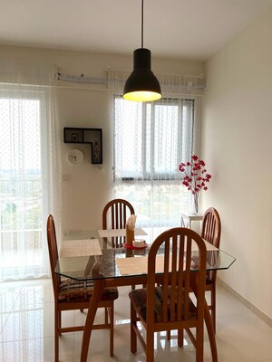 Dining area in 3 BHK Apartment at Godrej Aqua, International Airport Road – for Rent