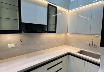 Kitchen in 2 BHK Apartment at Supertech Livingston, Sain Vihar – for Rent