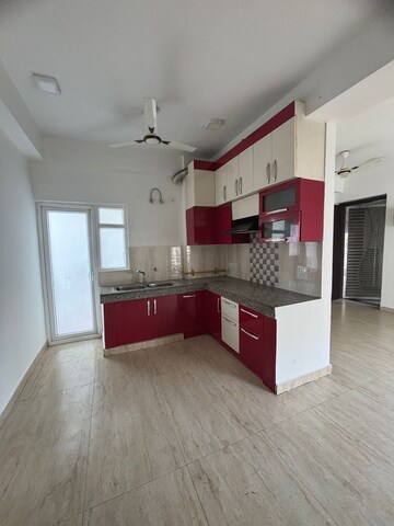 Kitchen in 2 BHK Apartment at Amrapali Village ii, Nyay Khand – for Sale