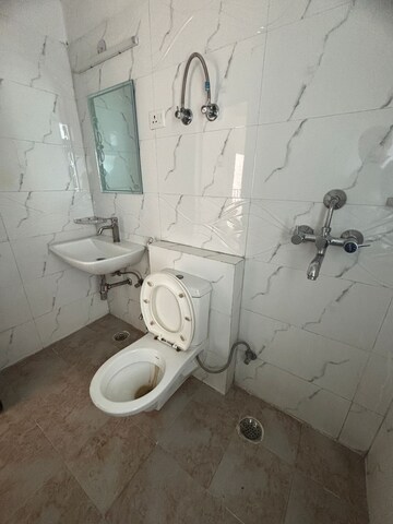 Bathroom in 2 BHK Apartment at Amrapali Village ii, Nyay Khand – for Sale