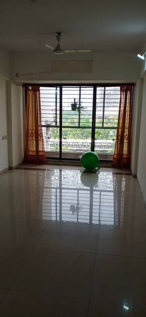 Living Room in 2 BHK Apartment at Concrete Sai Swar, Kharghar – for Rent