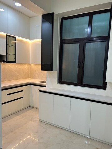 Kitchen in 3 BHK Apartment at Panchsheel Park, Sain Vihar – for Rent