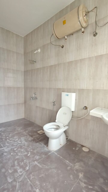 Bathroom in 2 BHK Apartment at Moghul Garden, Koregaon – for Rent