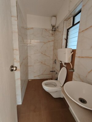 Bathroom in 2.5 BHK Apartment at Tulips CHS, Kavesar – for Sale