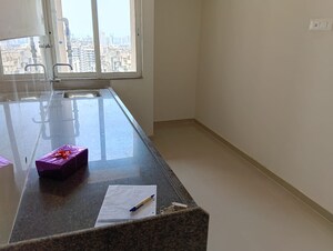 Kitchen in 3 BHK Apartment at Harmony Sky Suites, Ghodbunder Road – for Sale