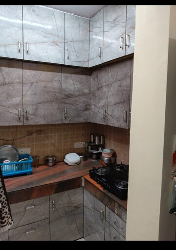 Kitchen in 2 BHK Apartment at MGI Gharaunda, Raj Nagar Extension – for Sale