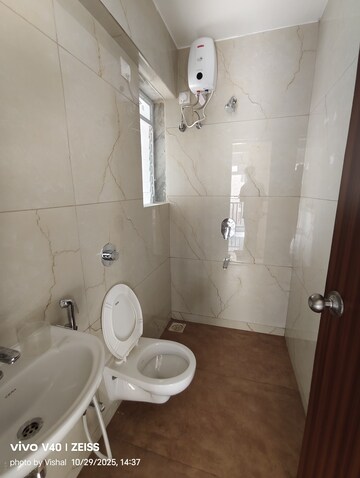 Bathroom in 1 BHK Apartment at Raunak Bliss, Ghodbunder Road – for Rent