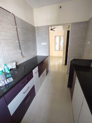 Kitchen in 1 BHK Apartment at Vihang Valley Rio, Kasarvadavali – for Rent