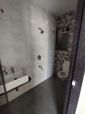 Bathroom in 1 BHK Apartment at Vihang Valley Rio, Kasarvadavali – for Rent
