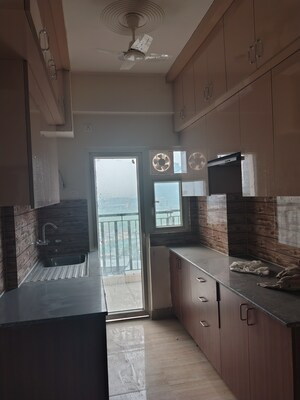 Kitchen in 3 BHK Apartment at Amrapali Tropical Garden, Tech Zone 4 Greater Noida – for Rent