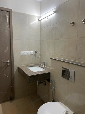Bathroom in 3 BHK Apartment at DLF The Skycourt, Sector 86 – for Rent