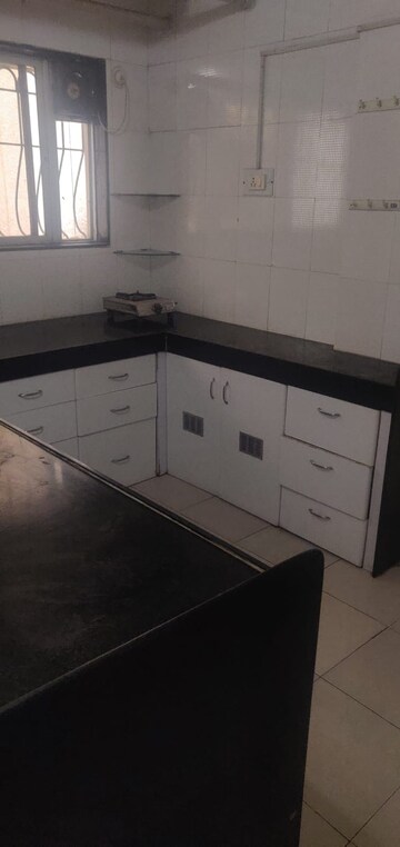 Kitchen in 1 BHK Apartment at Planet Millennium CHS, Pimple Saudagar – for Rent