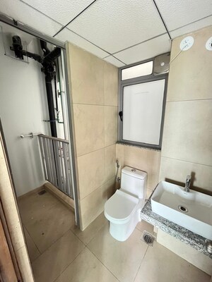 Bathroom in 1 BHK Apartment at Kalpataru Immensa, Kolshet Road – for Rent
