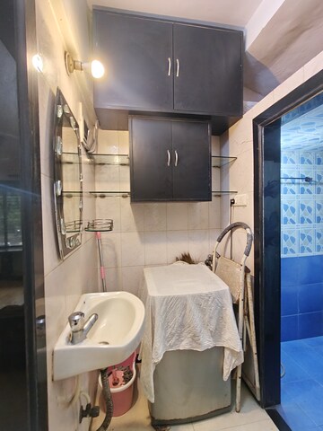 Bathroom in 1 BHK Apartment at Asmita Jyoti CHS, Malad West – for Rent