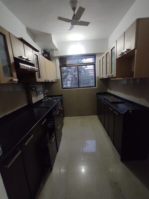Kitchen in 2 BHK Apartment at Vijay Vilas Taurus Building 11 To 15, Ghodbunder Road – for Rent