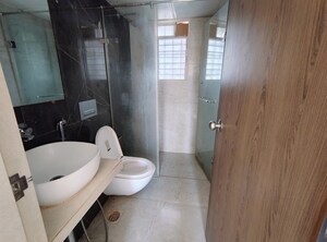 Bathroom in 1.5 BHK Apartment at Dosti West County, Balkum Pada – for Rent
