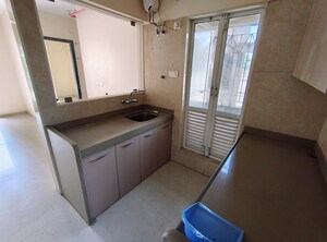 Bathroom in 1.5 BHK Apartment at Dosti West County, Balkum Pada – for Rent