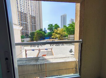 Kitchen in 1.5 BHK Apartment at Dosti West County, Balkum Pada – for Rent