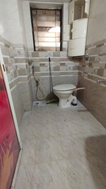 Bathroom in 2 BHK Apartment at Sankalpit CHS, Goregaon East – for Rent