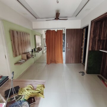 Living Room in 1 BHK Apartment at Raunak Heights, Ghodbunder Road – for Rent