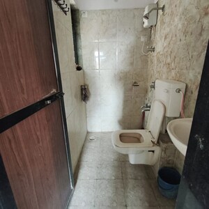 Bathroom in 1 BHK Apartment at Raunak Heights, Ghodbunder Road – for Rent