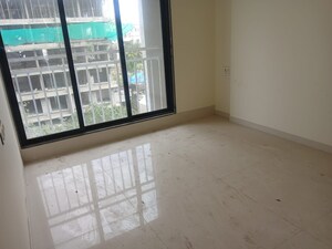 Room in 2 BHK Apartment at Rashi Tower, Goregaon East – for Sale