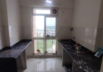 Kitchen in 2 BHK Apartment at Vijay Orovia, Ghodbunder Road – for Rent